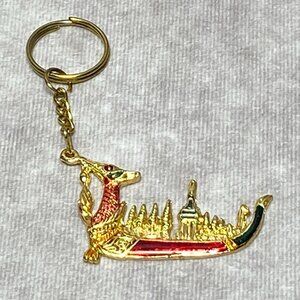 Golden Dragon Boat Keychain With Intricate Temple Design & Red/Green Details